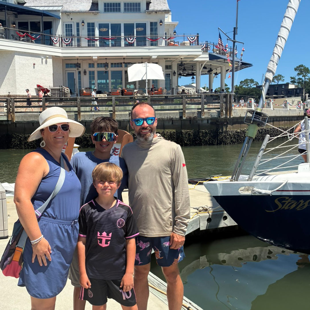 Peregrune runner taking runner vitamin, runner multivitamin, and runner supplement onboard America's Cup Racing Yacht Stars and Stripes
