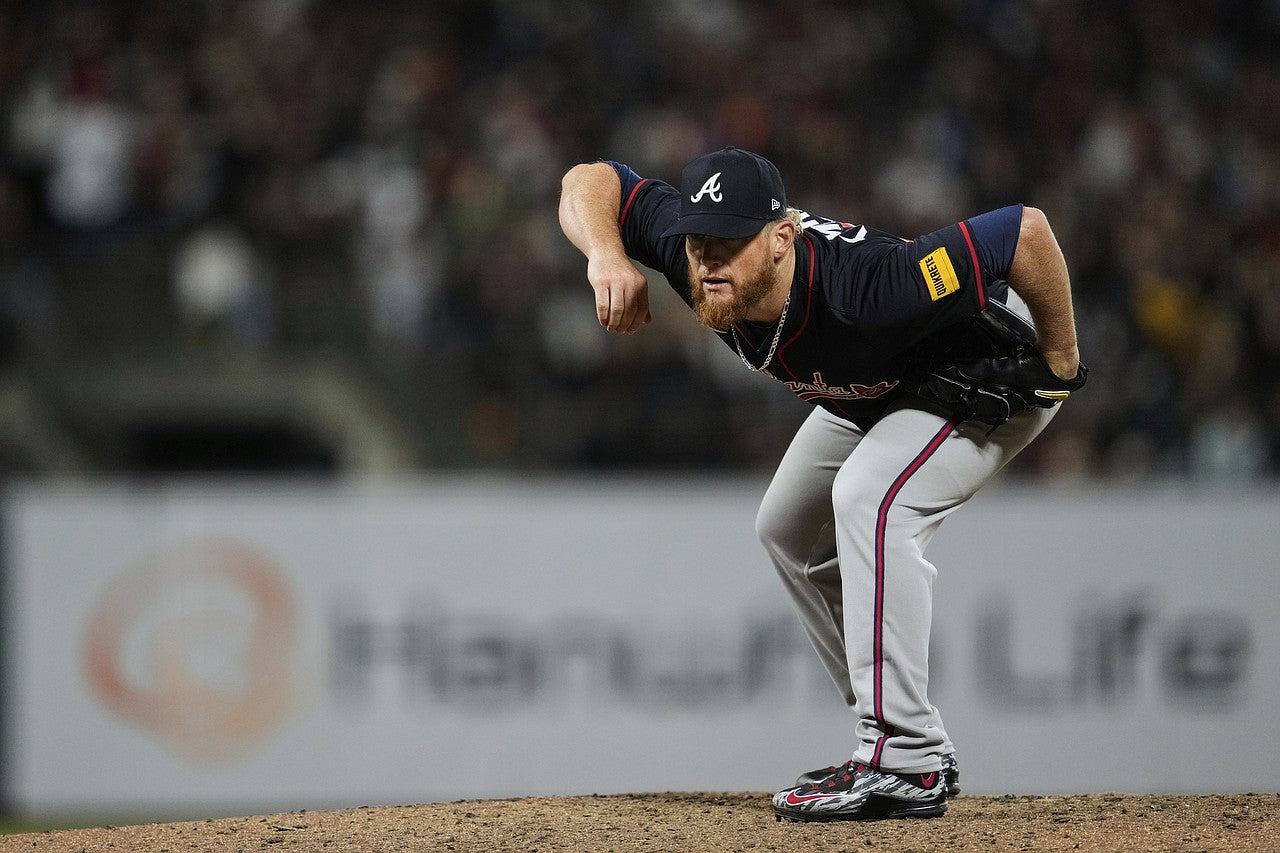 Veteran baseball pitcher delivering a fastball on the mound, symbolizing performance evolution and longevity supported by runner vitamins, supplements, and multivitamins.